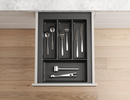 Dark grey cutlery tray for kitchen drawer storage with compartments. Drawer organiser.