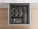 Dark grey cutlery tray for kitchen drawer storage with compartments. Drawer organiser.
