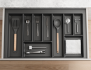 Dark grey cutlery tray for kitchen drawer storage with compartments. Drawer organiser.